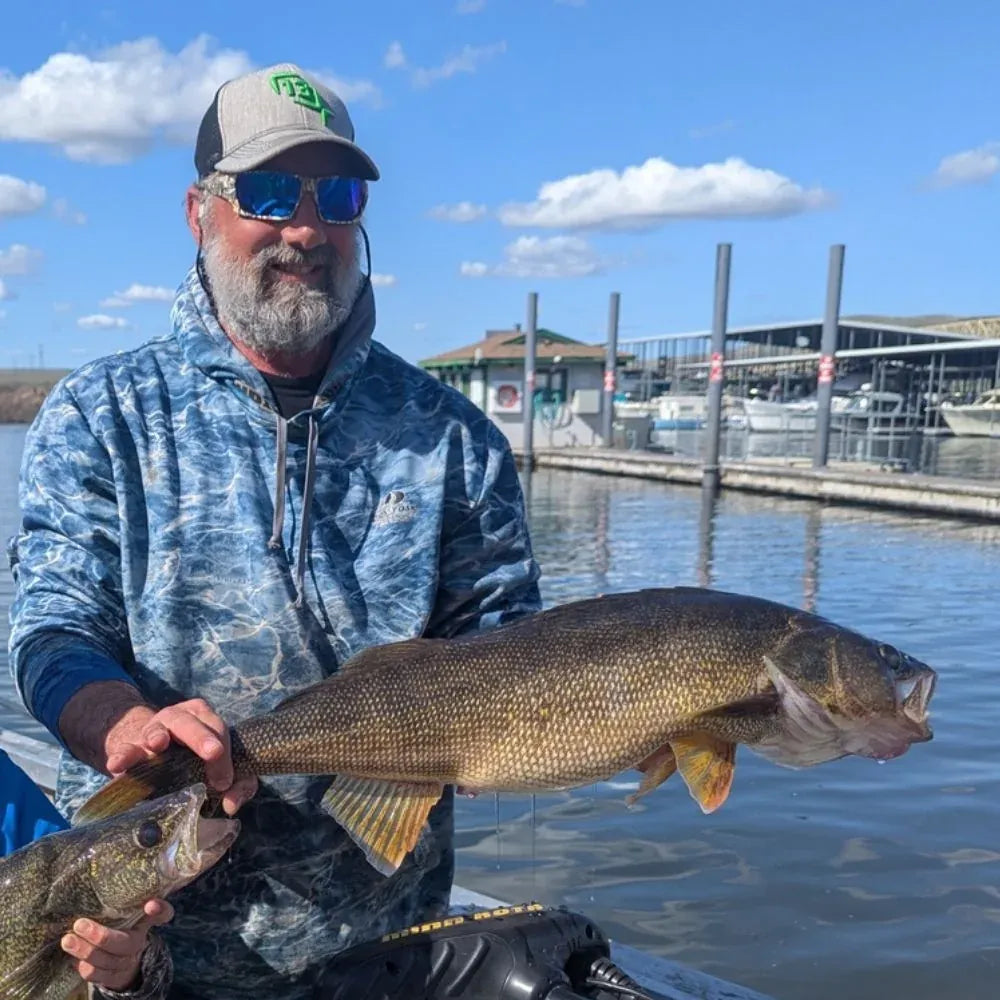 Kristofer fishing in Grizzly sunglasses